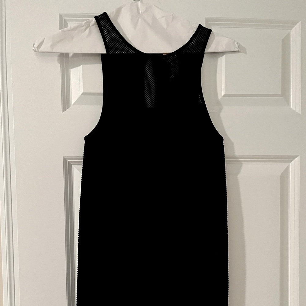 Black, BCBGeneration, body con, size M/L cocktail dress.